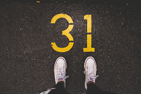 person wearing white Converse All-Star sneakers thumbnail