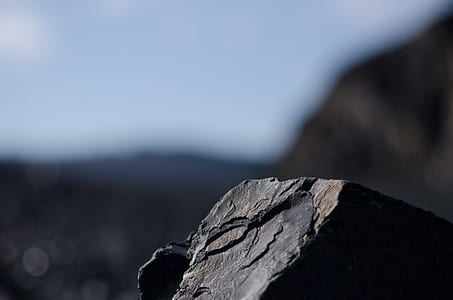close-up photo of black rock thumbnail