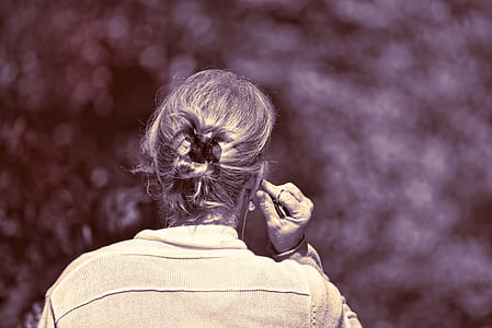 sepia photo of woman in white shirt thumbnail