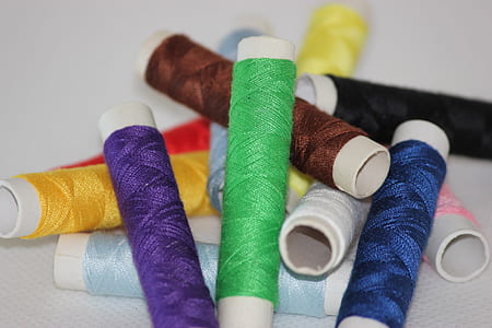assorted-color of threads thumbnail