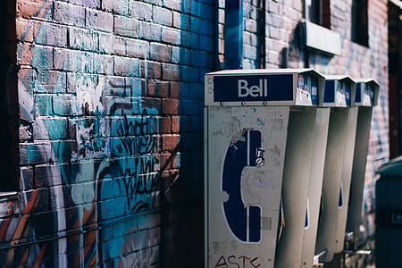 three gray-and-blue telephone booth thumbnail