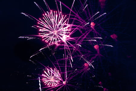 low-angle view of fireworks display thumbnail
