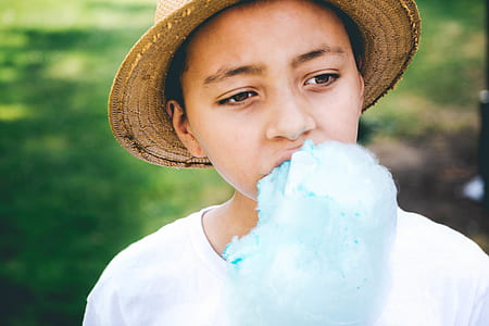 girl eating cotton candy thumbnail