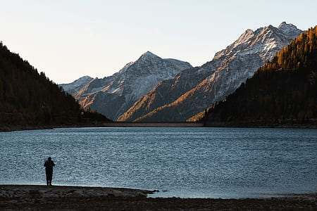 person standing shore thumbnail