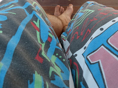 person wearing multicolored bottoms thumbnail