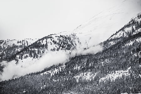 grayscale photo of snow capped mountain with avalanche thumbnail
