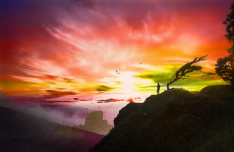silhouette of person near mountain thumbnail