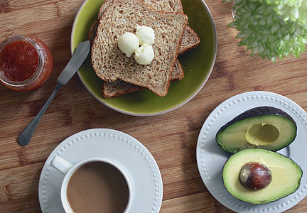 photo of avocado on plate beside sliced breads thumbnail