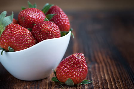 strawberries in bowl on furniture thumbnail