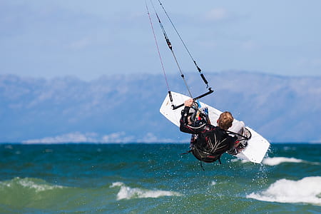 person playing windsurfing board thumbnail