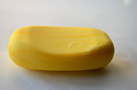 yellow soap on white surface thumbnail