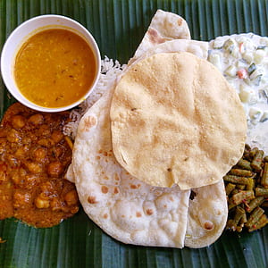 pita breads beside meat dish thumbnail