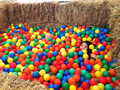 three children in ball pit thumbnail