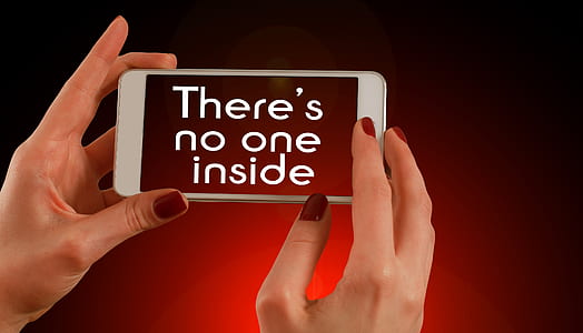 person holding white smartphone thumbnail