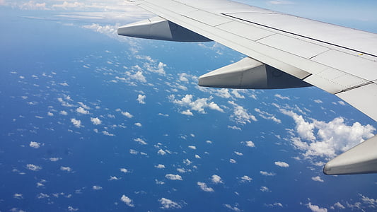 aircraft flying through sky thumbnail
