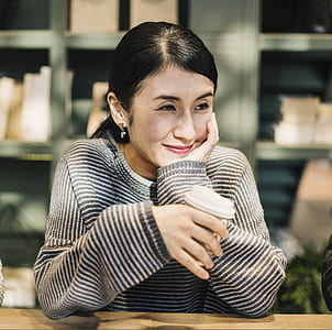 woman holding cup thumbnail