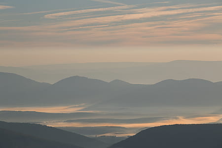 mountain rage view under cloudy sky thumbnail