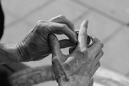grayscale photo of human hand thumbnail