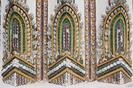 brown, green, and yellow wall decor thumbnail