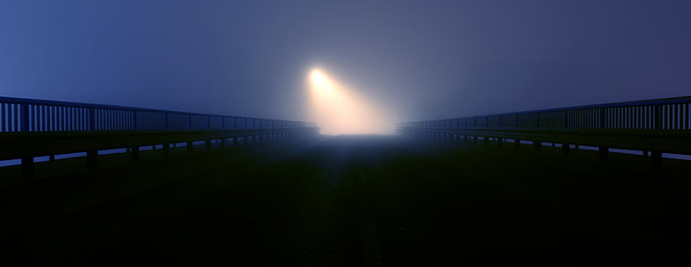 road with light at night time thumbnail