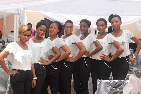 group of women wearing white scoop-neck cap-sleeved top thumbnail