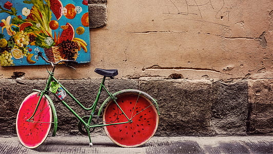 green bicycle on gray surface thumbnail