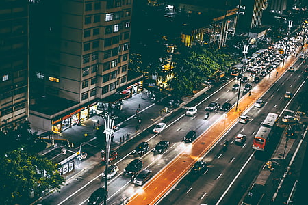 aerial view of cars on road during day time thumbnail