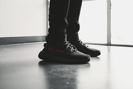 pair of black adidas Yeezy Boost 350 v2 thumbnail