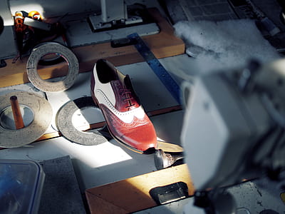 unpaired white and brown brogue shoee thumbnail