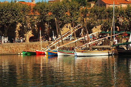 assorted boats near shore thumbnail