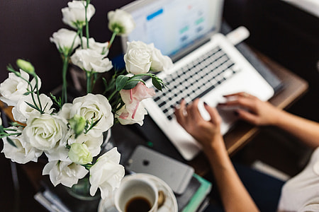 Woman working on laptop at home office thumbnail