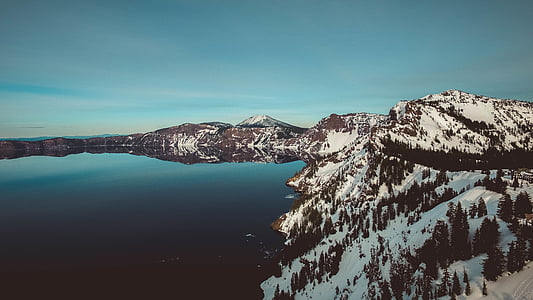aerial photography of rock formation near body of water thumbnail