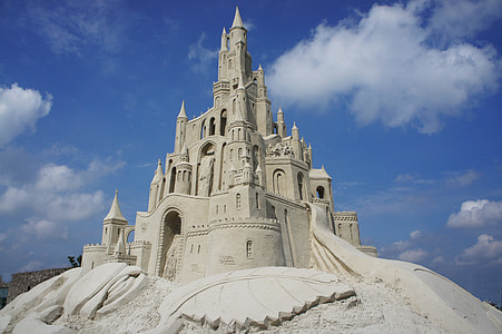 sand castle under blue and white skies thumbnail