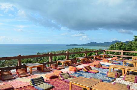 terrace with view of body of water thumbnail