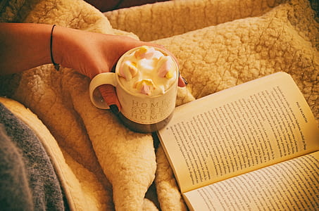 person holding mug thumbnail
