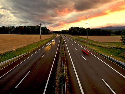 cars on road during daytime thumbnail