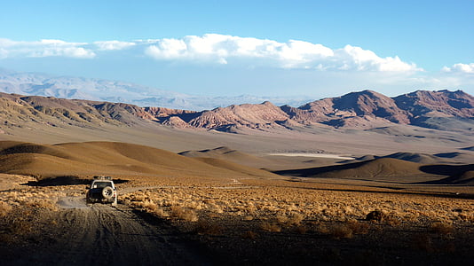 gray vehicle in desert thumbnail