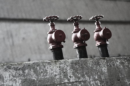 grayscale photography of spigots thumbnail