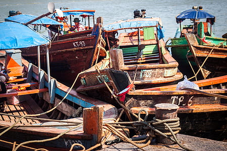 two green, gray, and brown boats on seat thumbnail