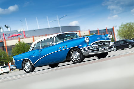 blue car on road thumbnail