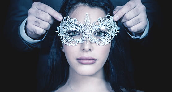 woman wearing white lace masquerade thumbnail