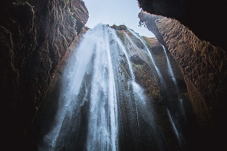 worm's eye view of a waterfall thumbnail