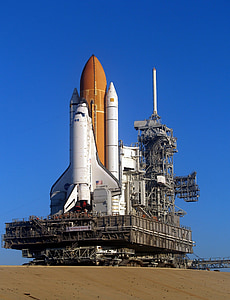white and brown space shuttle at bay during daytim e thumbnail