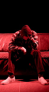 man sitting on sofa thumbnail