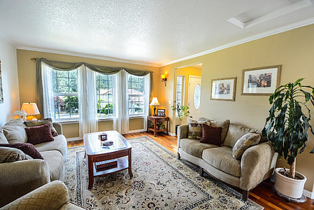 brown 2-seat couch near coffee table thumbnail