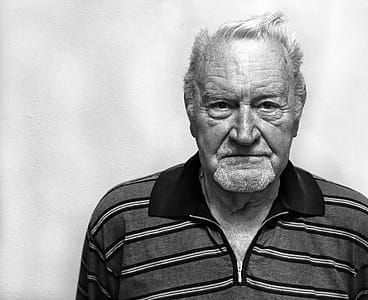 Grayscale Photography of Man Wearing Polo Shirt thumbnail