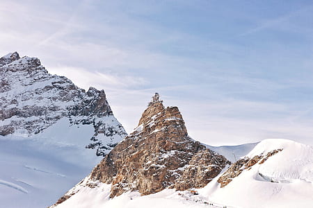 glacier mountain under blue and white sky thumbnail