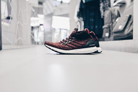 pair of red-and-black adidas ultraBOOST thumbnail