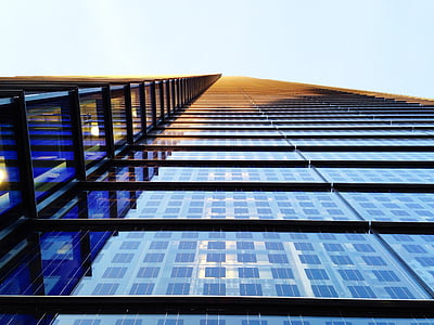 worms eye view of black building during sunset thumbnail