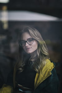 women in eyeglasses standing thumbnail